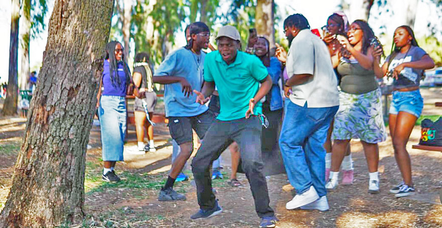 Students celebrate at the annual barbecue, sponsored by Black clubs and organizations,  at Lake Yosemite.