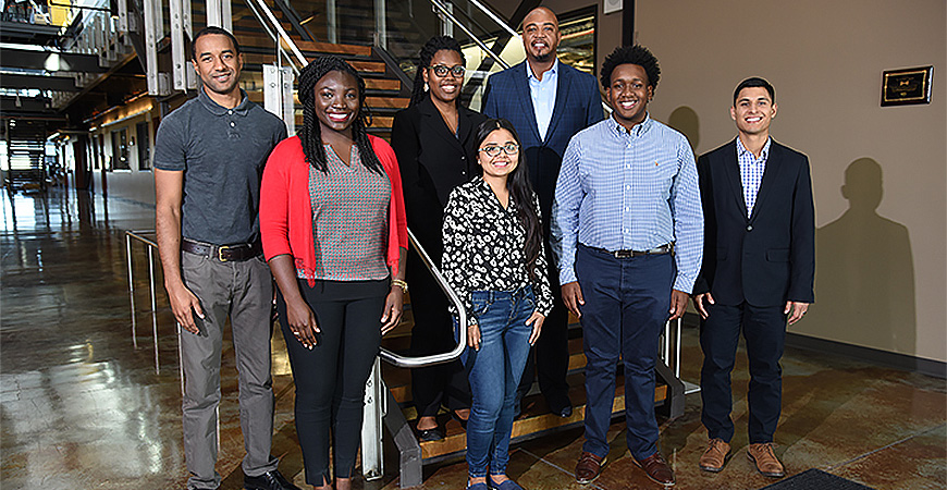 Six graduate students landed spots at Idaho National Laboratory through the National GEM Consortium (From left: Jordan Galloway, Denise Owusu, Stephanie Jones, Diana Perales, Terrence Buck (program manager), Malik Hayes, Jorge Ramirez.) Photo courtesy of Idaho National Laboratory.